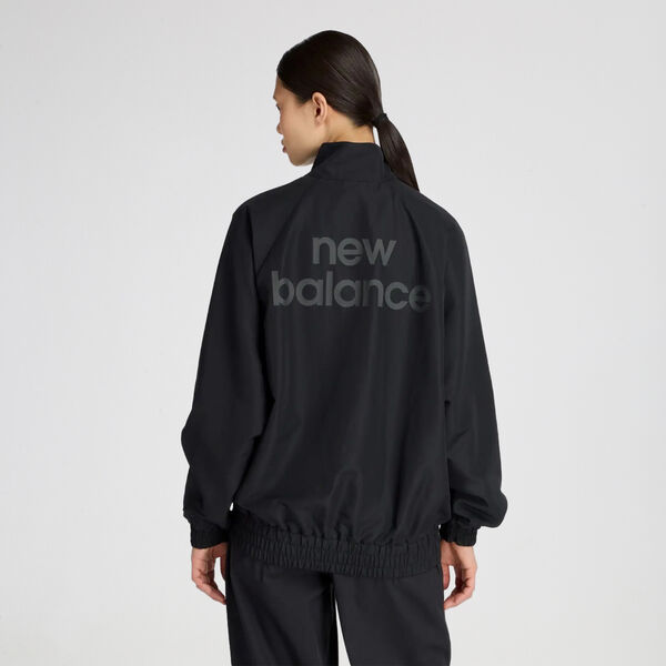 Buzo con Cierre New Balance Graphic Woven Mujer