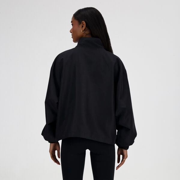 Campera New Balance Sport Essentials Mujer