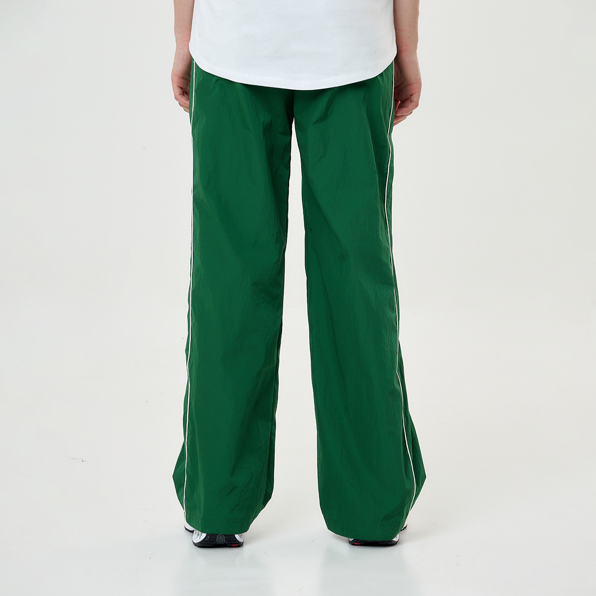 Pantalón Nike Windrunner Woven Mujer,  image number null