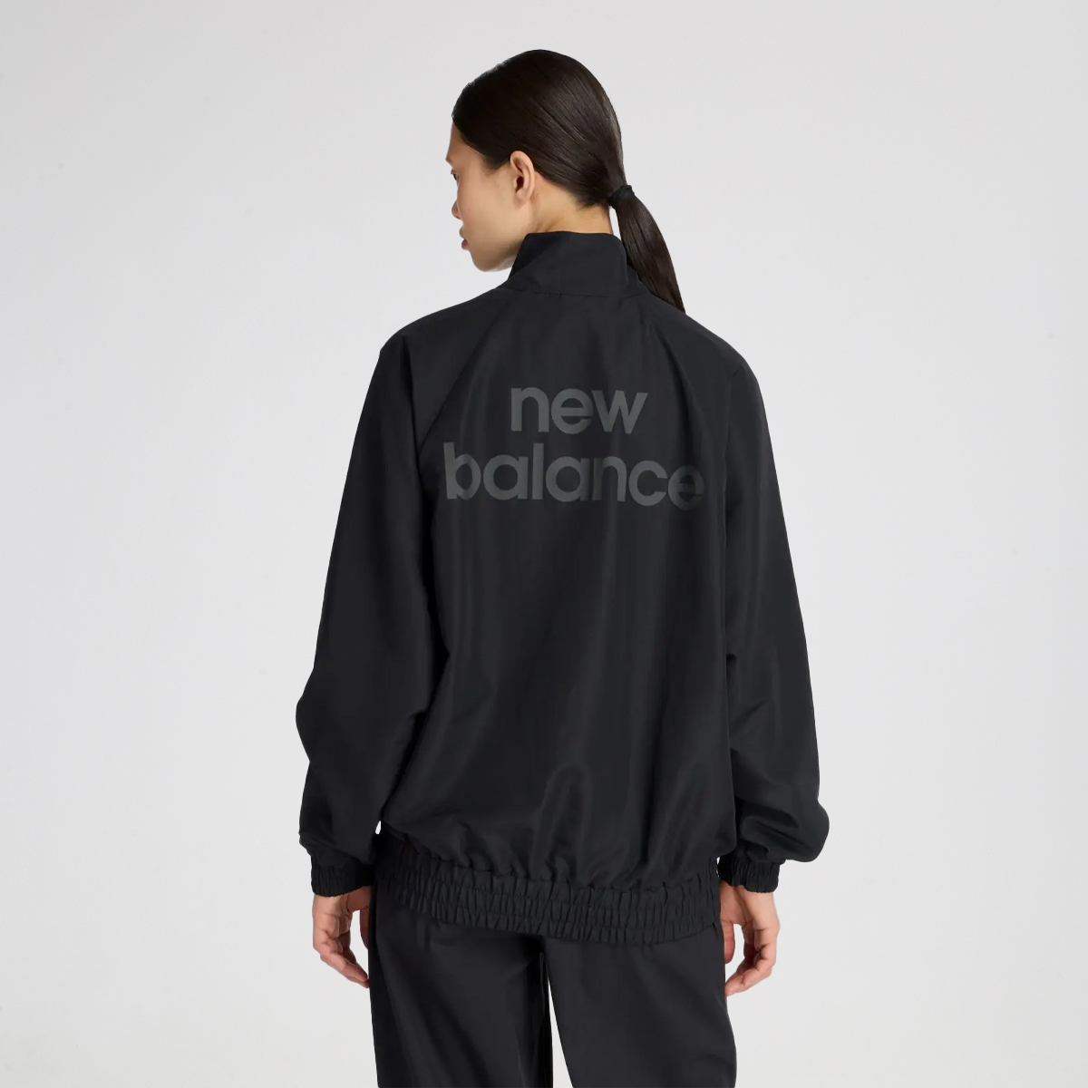Buzo con Cierre New Balance Graphic Woven Mujer,  image number null
